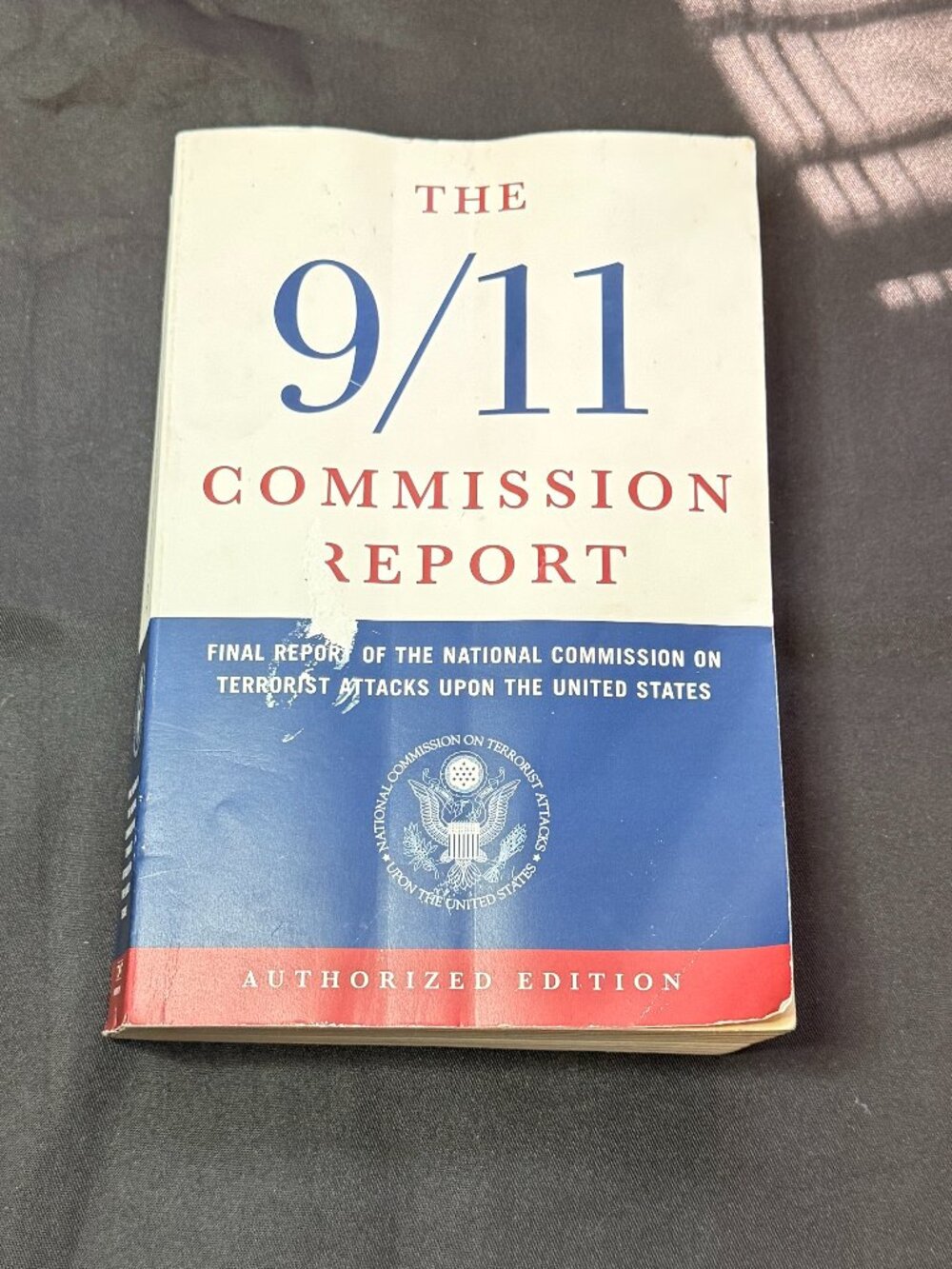 The 9/11 Commission Report softcover book